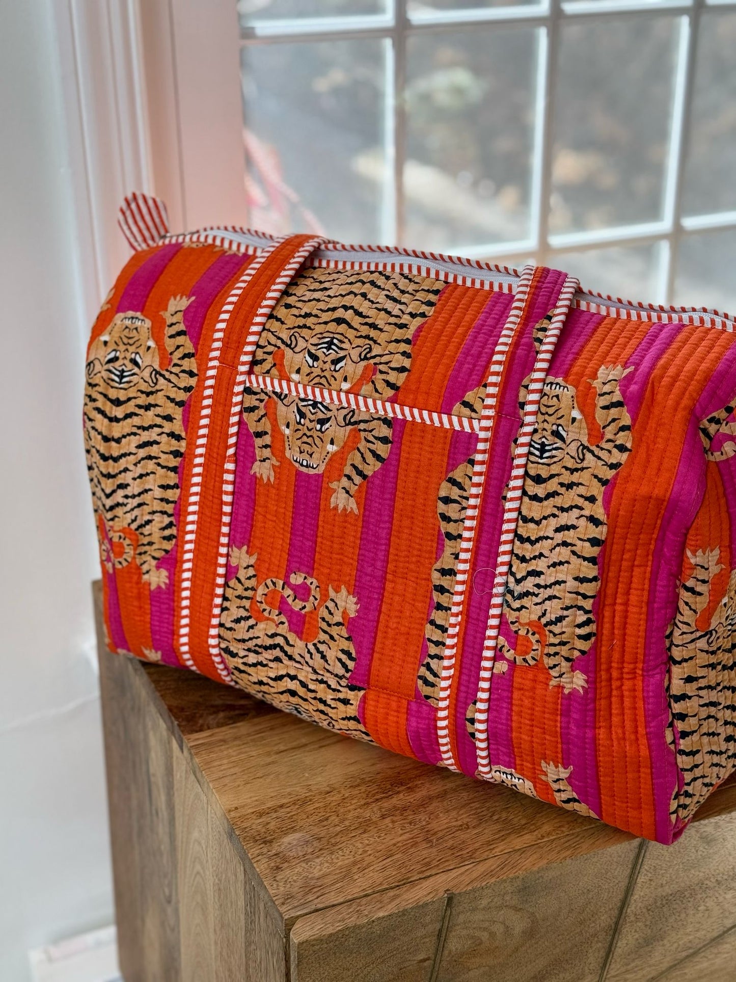 Block Printed Orange Duffle Bag