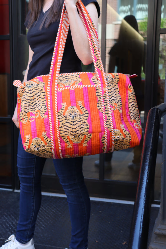 Block Printed Orange Duffle Bag