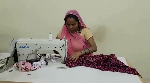 Stitching a printed garment at the sewing machine
